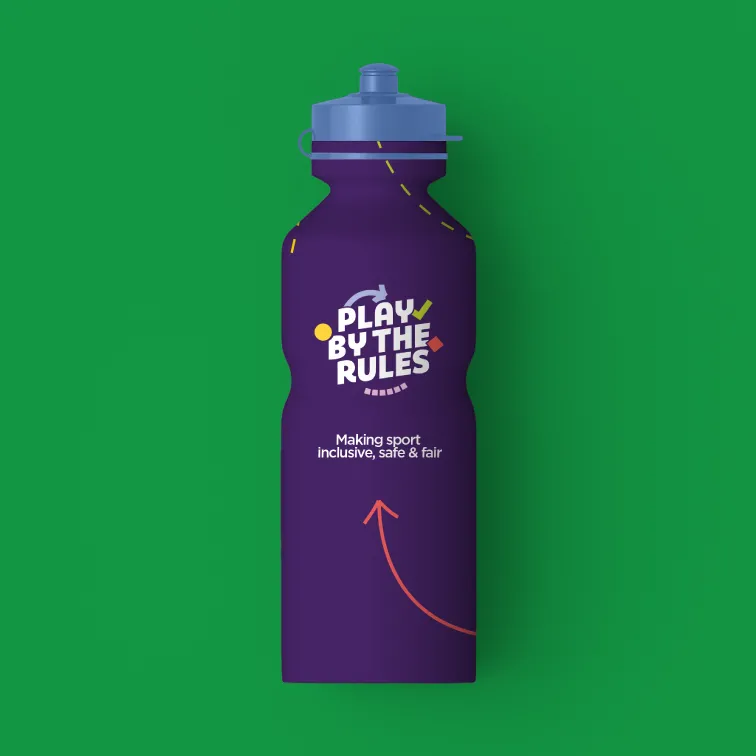 A purple patterned Play by the Rules drink bottle on a green background