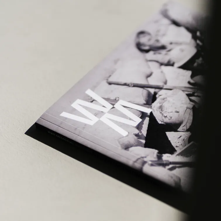 A close up of the logo on the cover of WM Magazine